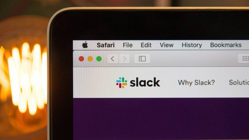 The desktop version of Slack shown on a laptop's display